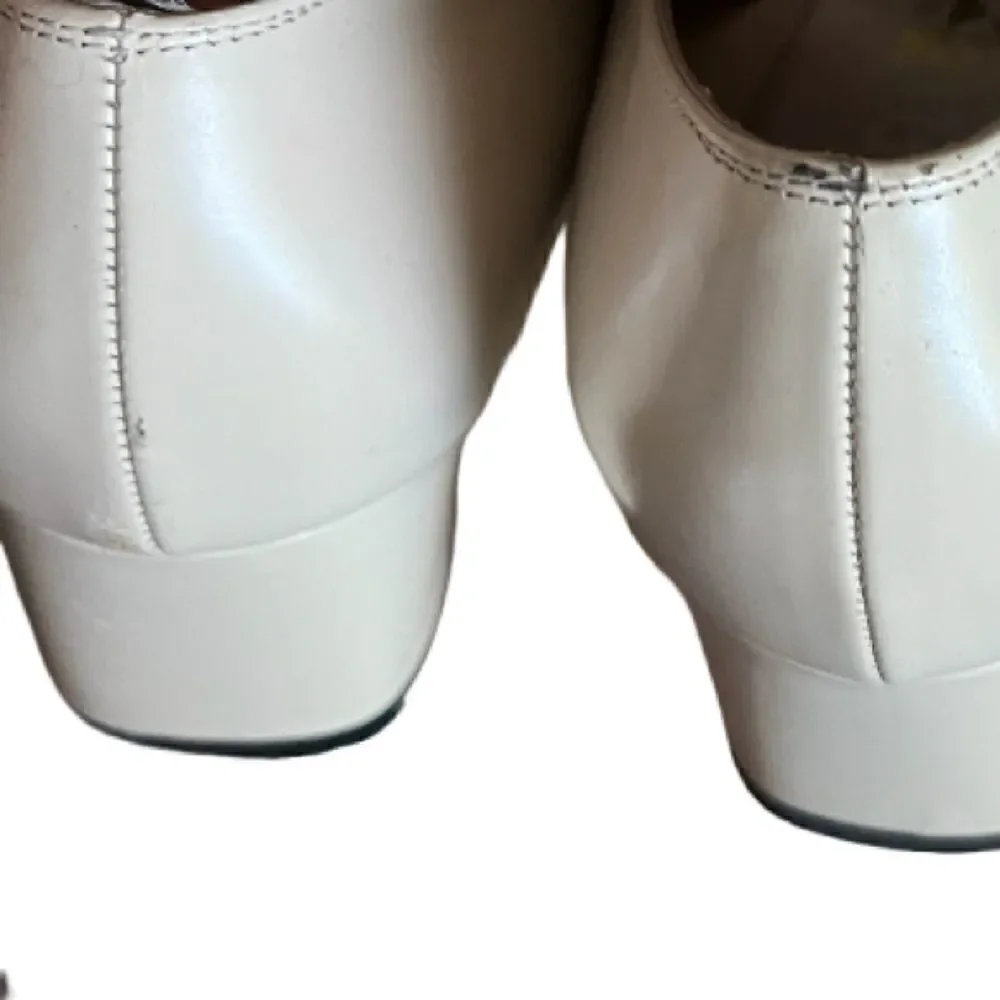 Salvatore Ferragamo chunky heels.